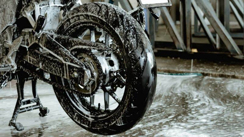 Motorcycle Washing With Soapwater
